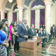 Anthony (Tony) Cox, at lectern, stands alongside Beverly White of KNBC and Pat Harvey of KCBS as Los Angeles City Council President Herb Wesson speaks at Black History Month kickoff.